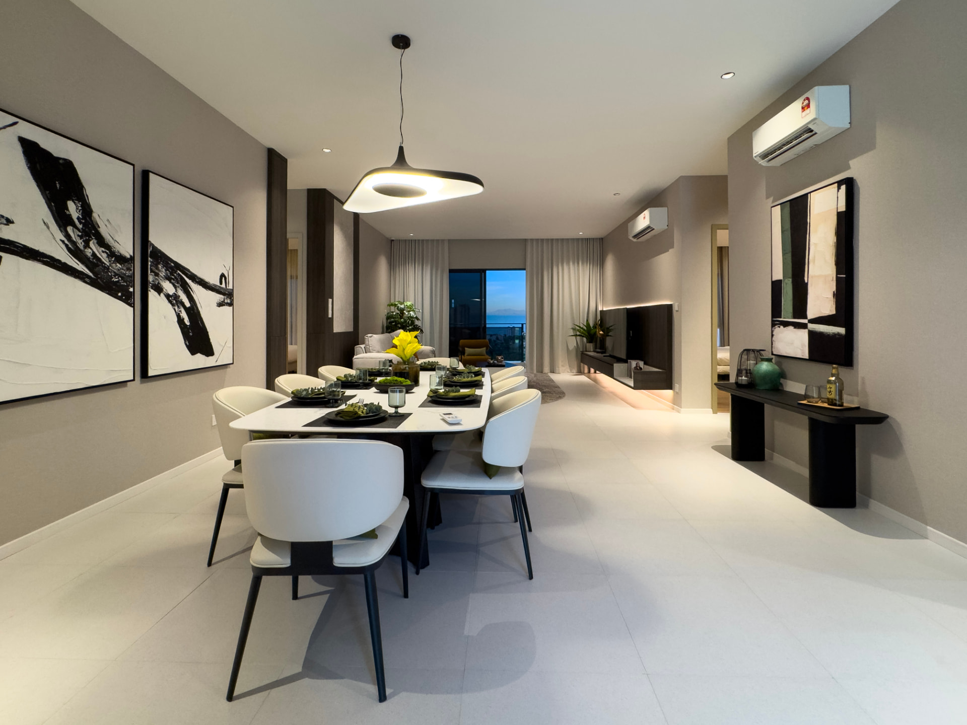 Waterstone showroom dining and living area with sea view