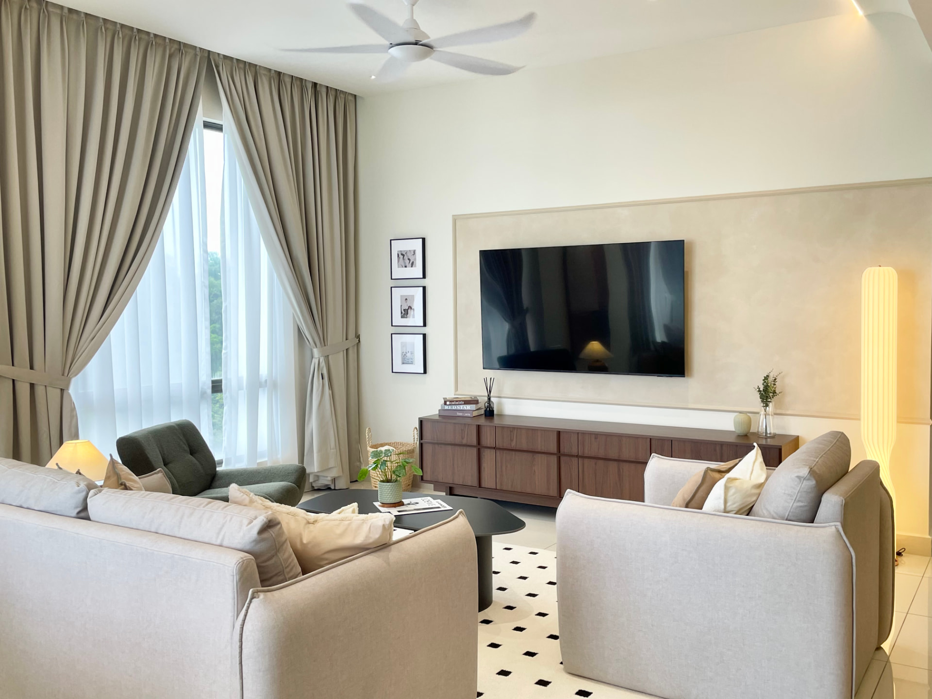The Marin showroom lounge with tall windows and garden view