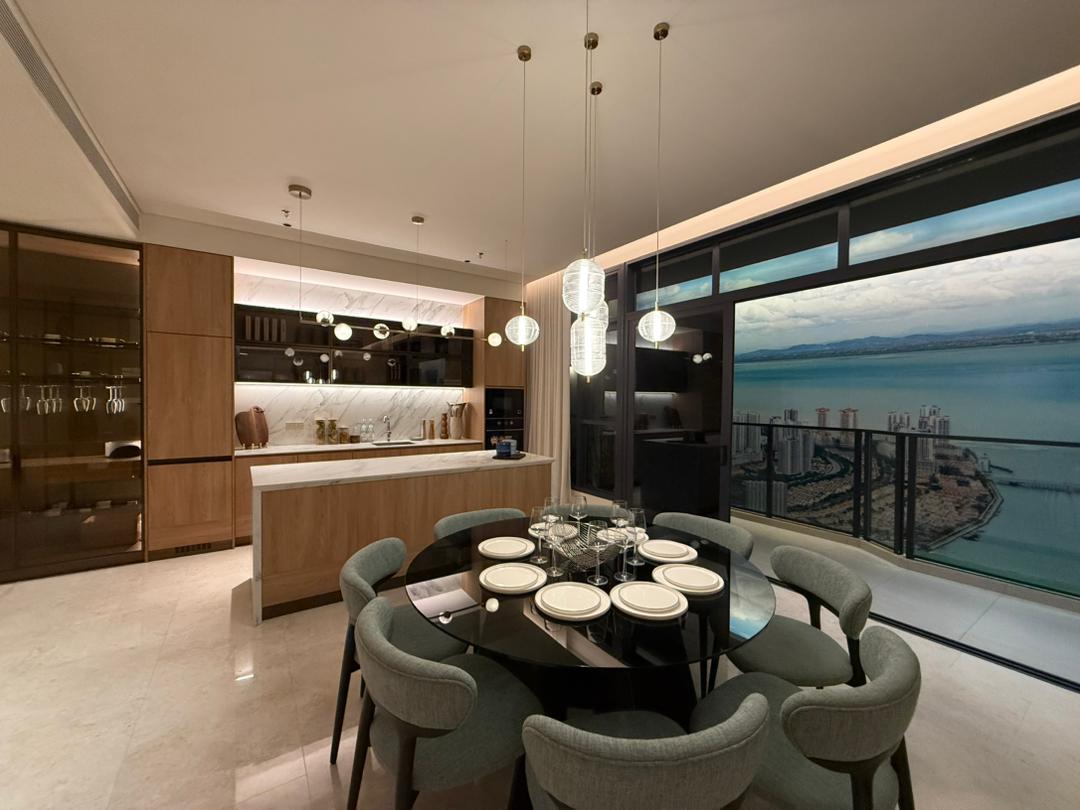 Westin Residences showroom dining area with island kitchen and sea view