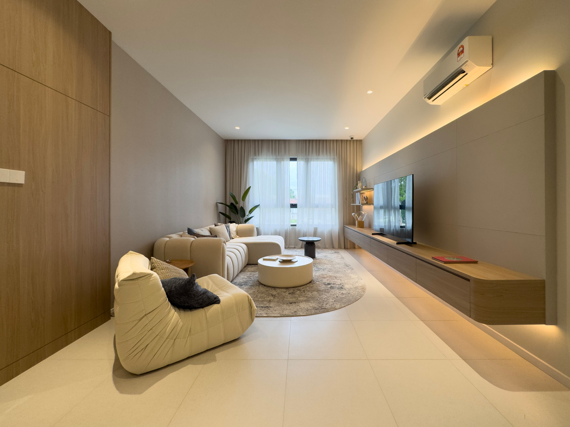 Waterstone showroom living room with feature TV wall